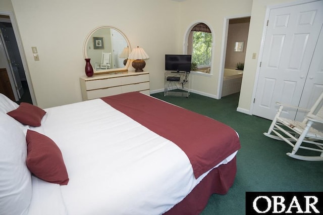 carpeted bedroom with baseboards