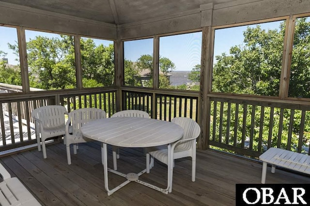 sunroom / solarium featuring a wealth of natural light