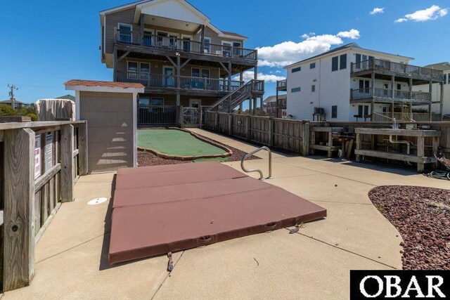 view of community with a patio