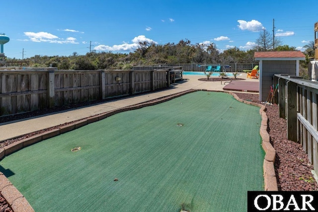 view of pool with a patio, fence, and a fenced in pool