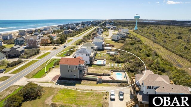 bird's eye view featuring a residential view and a water view