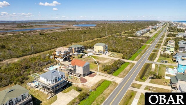 aerial view with a water view and a residential view