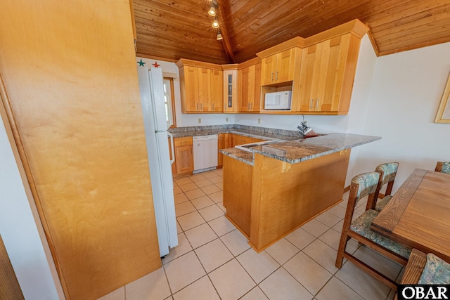 65 Ocean Blvd Lot 3-4, Southern Shores, NC 27949 - kitchen with white appliances, wood ceiling, vaulted ceiling, a peninsula, and light tile patterned floors