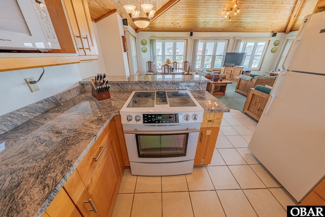 65 Ocean Blvd Lot 3-4, Southern Shores, NC 27949 - kitchen with wooden ceiling, white appliances, a peninsula, vaulted ceiling, and light tile patterned flooring