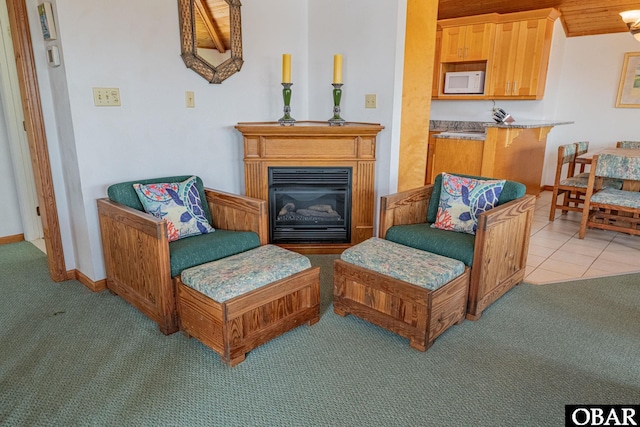 65 Ocean Blvd Lot 3-4, Southern Shores, NC 27949 - living area with light carpet and a glass covered fireplace