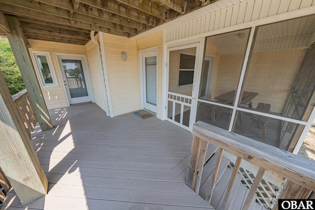 65 Ocean Blvd Lot 3-4, Southern Shores, NC 27949 - wooden deck with a sunroom