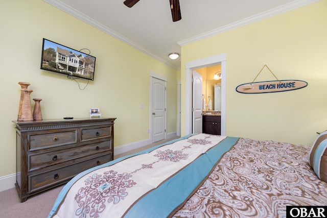 bedroom featuring ceiling fan, connected bathroom, carpet flooring, baseboards, and ornamental molding