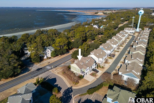 bird's eye view with a water view and a residential view