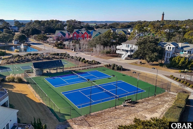 birds eye view of property with a residential view