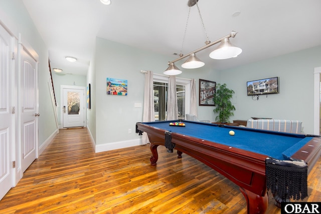 recreation room featuring billiards, radiator, wood finished floors, and baseboards