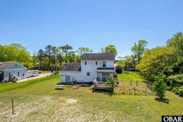 147 Dr Newbern Rd Lot # 3, Powells Point, NC 27966 - back of house with a lawn, fence, and a deck