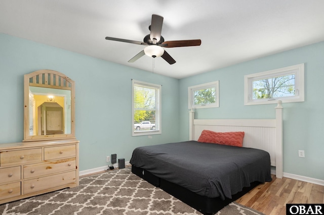 147 Dr Newbern Rd Lot # 3, Powells Point, NC 27966 - bedroom featuring baseboards, a ceiling fan, and wood finished floors