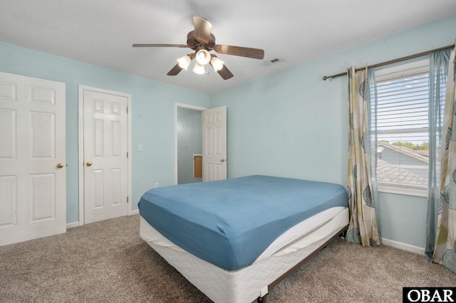 147 Dr Newbern Rd Lot # 3, Powells Point, NC 27966 - carpeted bedroom with visible vents, baseboards, and ceiling fan