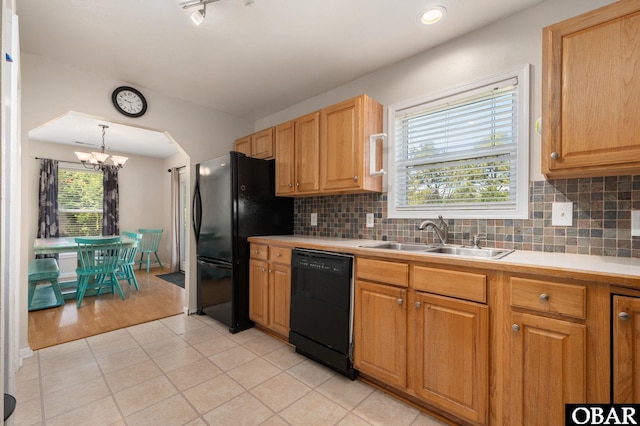 147 Dr Newbern Rd Lot # 3, Powells Point, NC 27966 - kitchen featuring a sink, a chandelier, black appliances, light countertops, and light tile patterned floors