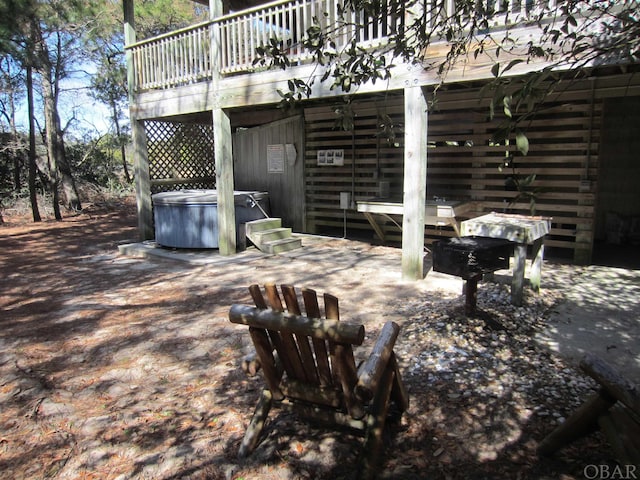 view of patio / terrace featuring a hot tub