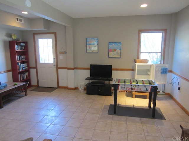 rec room featuring recessed lighting, visible vents, baseboards, and light tile patterned floors