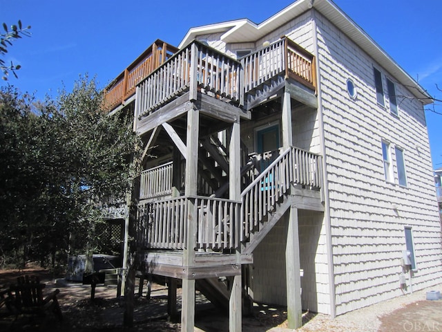 view of property exterior featuring a balcony