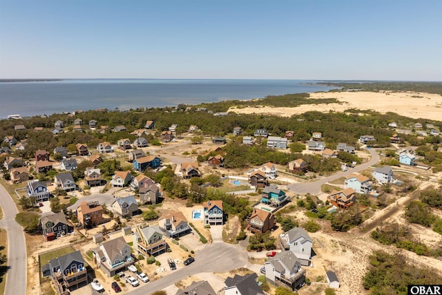 aerial view with a water view and a residential view