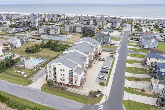 aerial view featuring a residential view and a water view