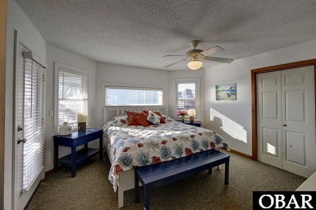 24255 S Shore Dr Lot # 9, Rodanthe, NC 27968 - carpeted bedroom with ceiling fan, a textured ceiling, and baseboards