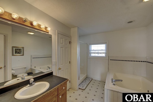 24255 S Shore Dr Lot # 9, Rodanthe, NC 27968 - full bath featuring a bath, vanity, toilet, a textured ceiling, and a stall shower
