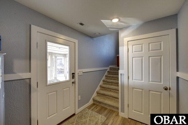 24255 S Shore Dr Lot # 9, Rodanthe, NC 27968 - foyer featuring stairway, light wood-style flooring, and baseboards