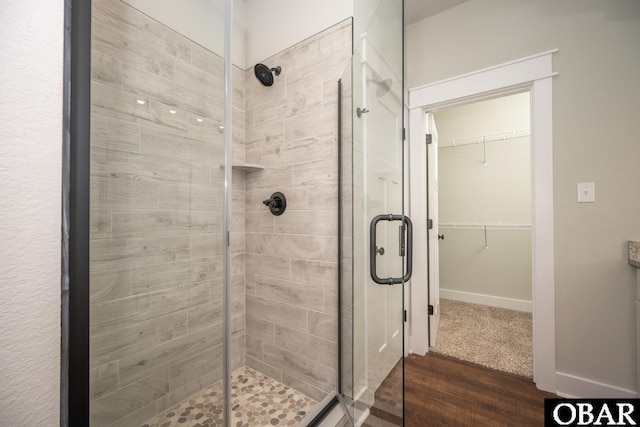 329 Country Club Rd Lot A, Lot A, Camden, NC 27921 - full bath with a shower stall, a spacious closet, and wood finished floors