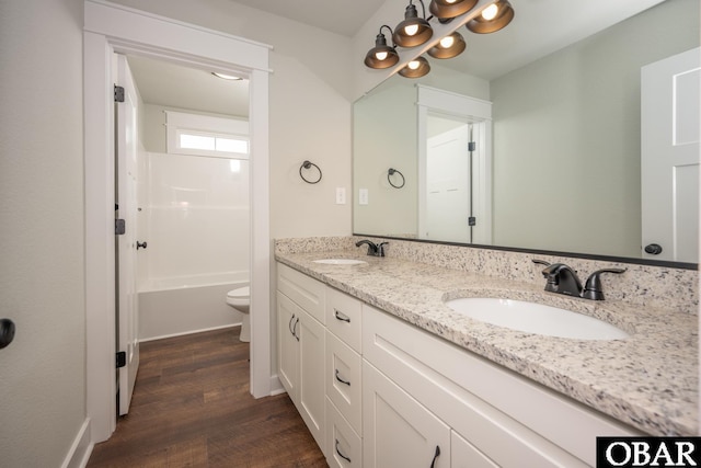329 Country Club Rd Lot A, Lot A, Camden, NC 27921 - full bathroom with double vanity, toilet, wood finished floors, and bathing tub / shower combination