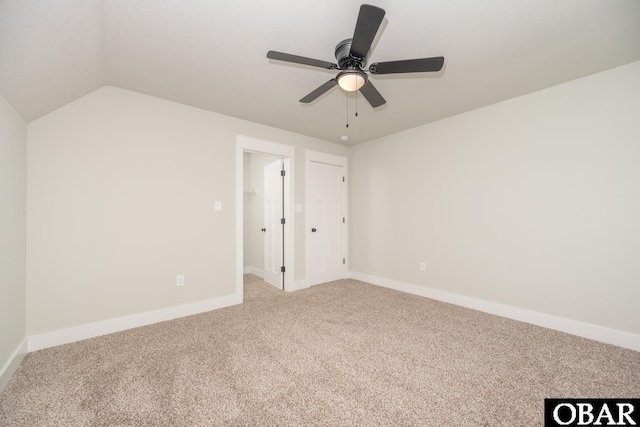 329 Country Club Rd Lot A, Lot A, Camden, NC 27921 - unfurnished bedroom featuring carpet, baseboards, a spacious closet, and lofted ceiling
