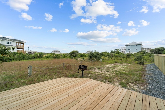 wooden deck featuring fence