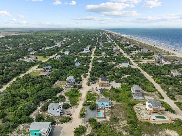 aerial view featuring a view of the beach and a water view