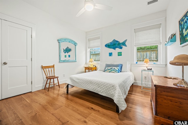 197 Wax Myrtle Trl Lot # 15R, Southern Shores, NC 27949 - bedroom with multiple windows, wood finished floors, baseboards, and a ceiling fan