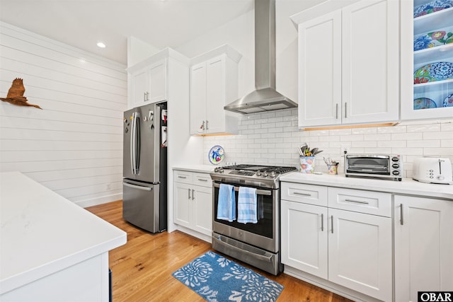 197 Wax Myrtle Trl Lot # 15R, Southern Shores, NC 27949 - kitchen featuring stainless steel appliances, wall chimney range hood, light countertops, recessed lighting, and wooden walls