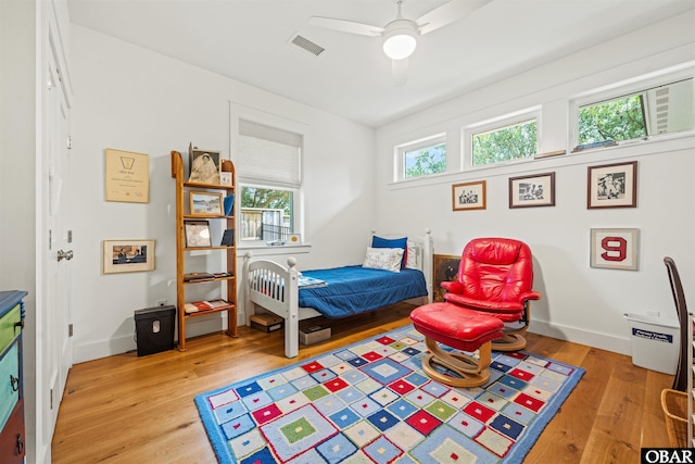 197 Wax Myrtle Trl Lot # 15R, Southern Shores, NC 27949 - bedroom with light wood finished floors, a ceiling fan, and baseboards