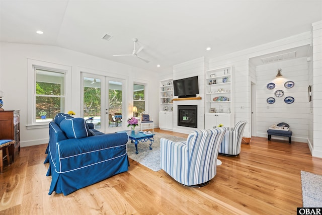 197 Wax Myrtle Trl Lot # 15R, Southern Shores, NC 27949 - living room featuring a glass covered fireplace, light wood-style flooring, baseboards, built in features, and recessed lighting