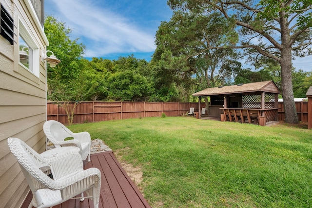 view of yard featuring a fenced backyard and outdoor dry bar