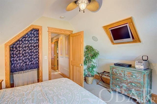 bedroom featuring ceiling fan, carpet, and vaulted ceiling