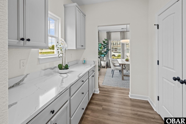 200 E Ryker Rd Lot # 37, Moyock, NC 27958 - kitchen featuring dark wood finished floors and light stone countertops