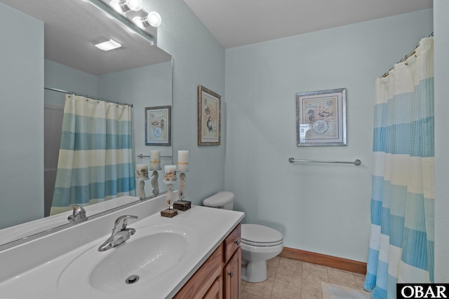 bathroom with vanity, a shower with shower curtain, baseboards, tile patterned floors, and toilet