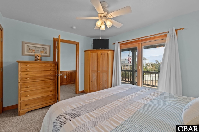 carpeted bedroom with access to exterior, baseboards, and ceiling fan