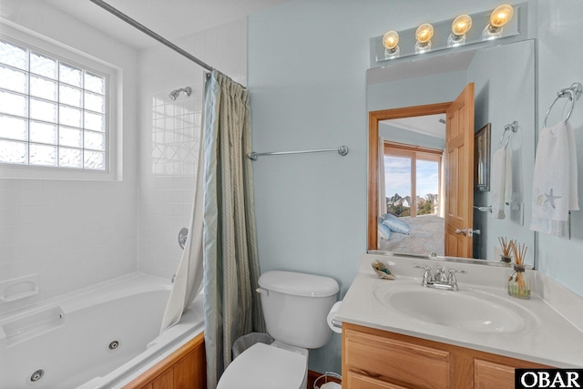 full bath with toilet, vanity, and a combined bath / shower with jetted tub