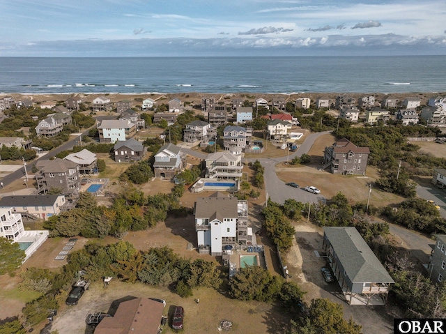 aerial view with a residential view and a water view