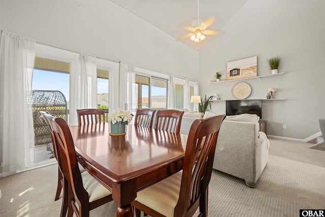 614-B Sea Oats Ct Lot # 6, Corolla, NC 27927 - dining room featuring light carpet, plenty of natural light, a ceiling fan, and high vaulted ceiling