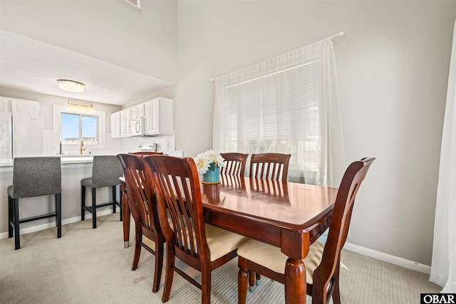 614-B Sea Oats Ct Lot # 6, Corolla, NC 27927 - dining space featuring light carpet