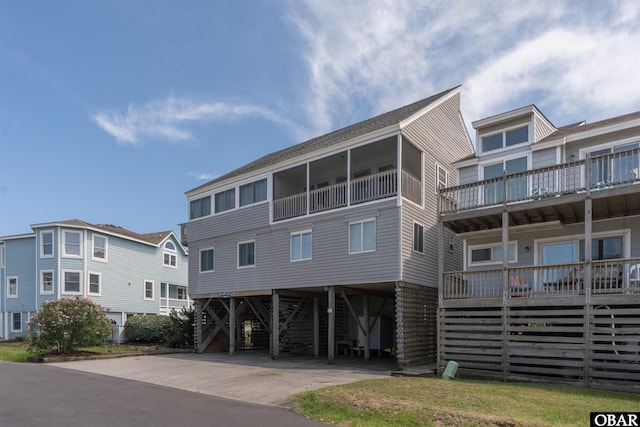 614-B Sea Oats Ct Lot # 6, Corolla, NC 27927 - view of property featuring a carport and driveway