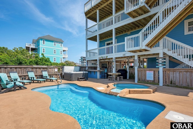 56432 NC-12 Hwy Lot 1, Hatteras, NC 27943 - view of swimming pool featuring an in-ground hot tub, fence, stairs, and a patio area