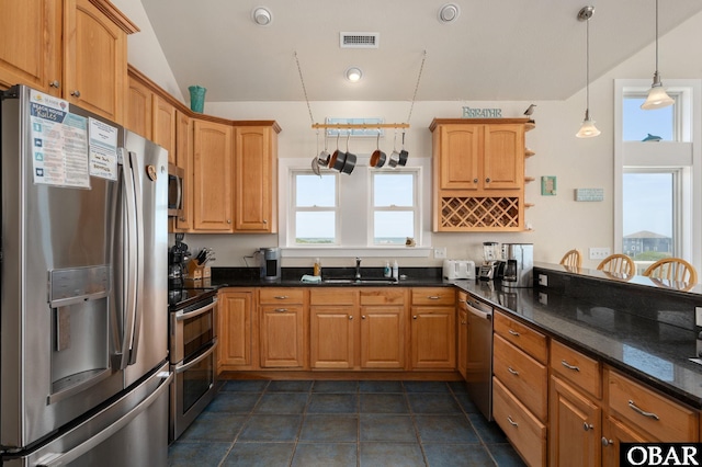 56432 NC-12 Hwy Lot 1, Hatteras, NC 27943 - kitchen with stainless steel appliances, plenty of natural light, a sink, vaulted ceiling, and dark stone countertops