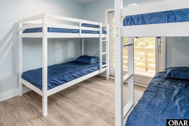 bedroom with wood finished floors