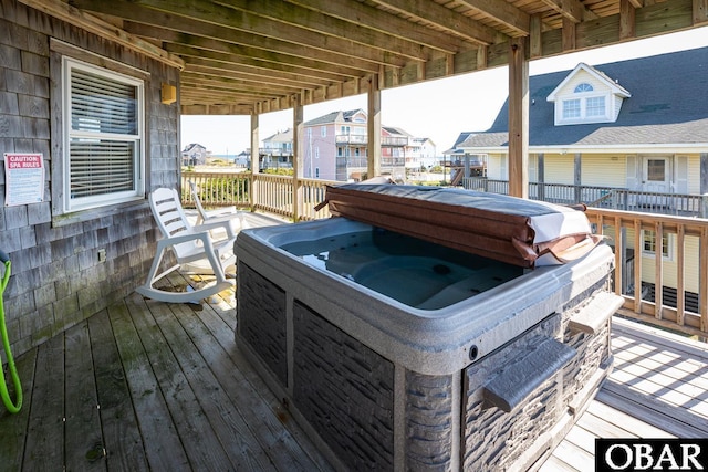 23212 Sea Oats Dr Lot 18, Rodanthe, NC 27968 - wooden deck with a hot tub and a residential view