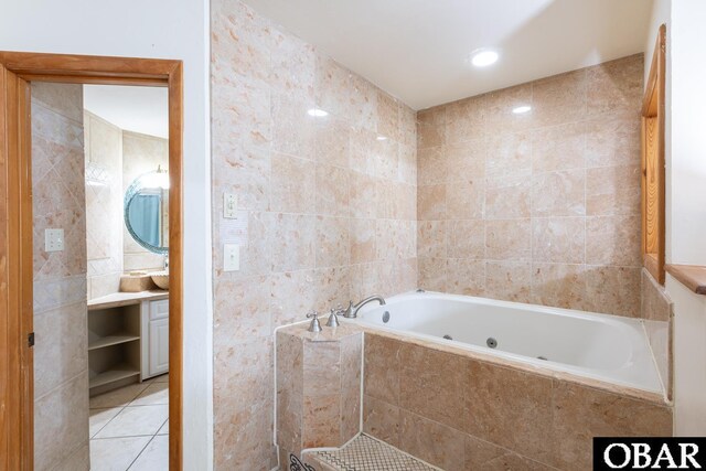 23212 Sea Oats Dr Lot 18, Rodanthe, NC 27968 - full bathroom featuring a whirlpool tub, tile patterned floors, tile walls, and vanity